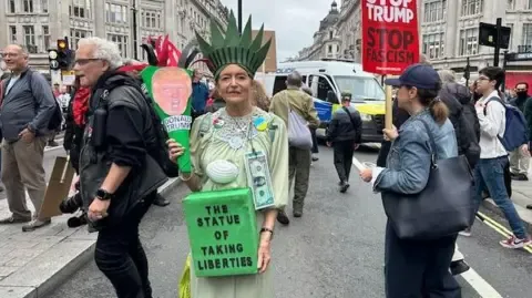 Thousands Demonstrators Assemble in Downtown London to Oppose Trump's Return Diplomatic Journey